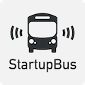 A light grey rectangle with a black
										  front of a bus with wave like lines on
										  the side. Below the bus is written
										  StartupBus.